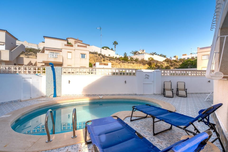Property building, Living room, Swimming pool