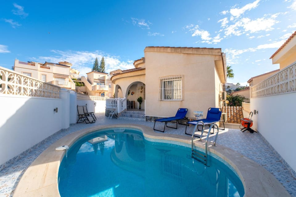 Property building, Living room, Swimming pool