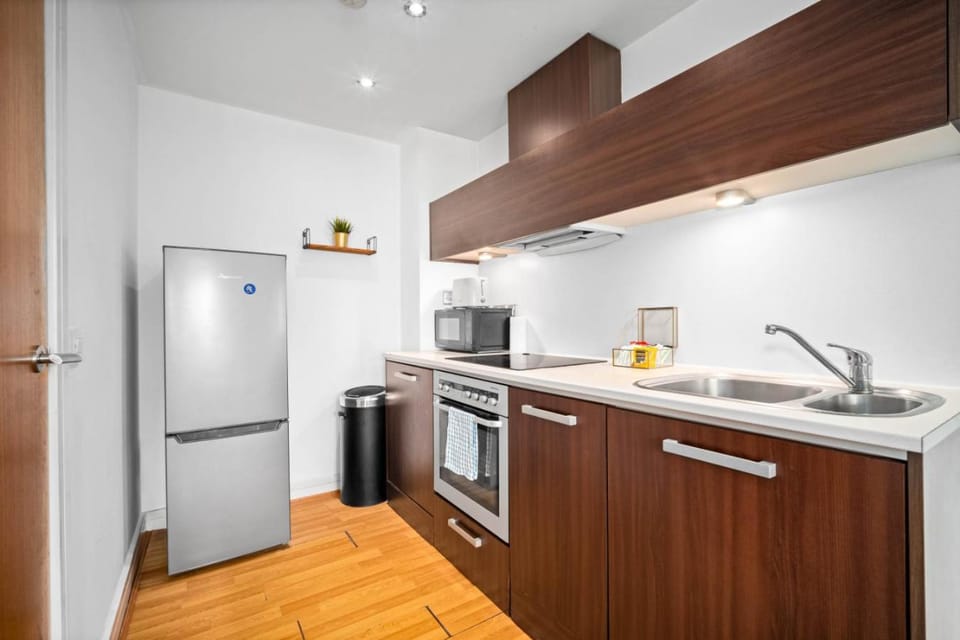 Kitchen or kitchenette, oven, stove, toaster