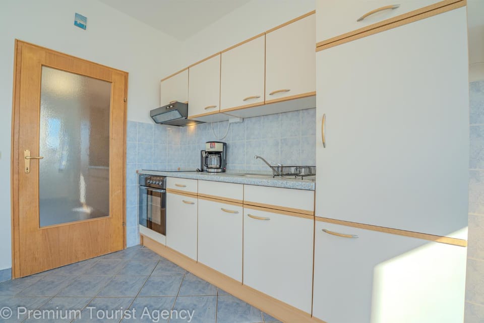 Kitchen or kitchenette, oven, stove