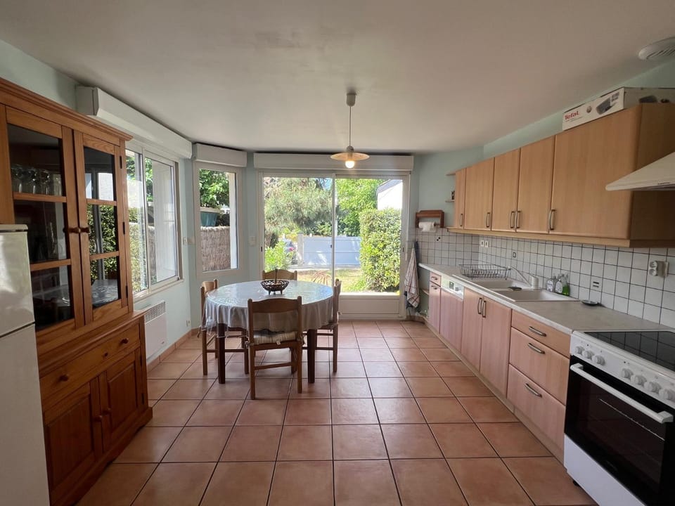 Dining area, dishwasher, stove, toaster, kitchen