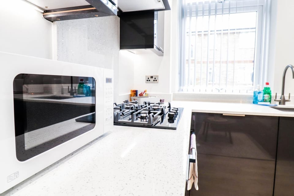 Kitchen or kitchenette, oven, stove, toaster