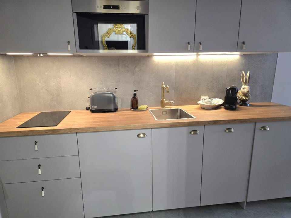 Kitchen or kitchenette, stove