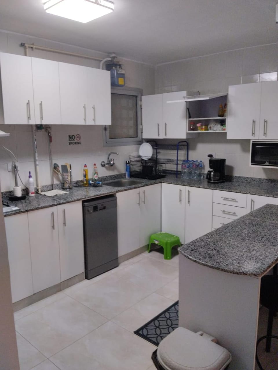 Kitchen or kitchenette, dishwasher, stove