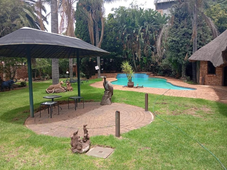 Natural landscape, Garden, Garden view, Pool view, Swimming pool, sunbed