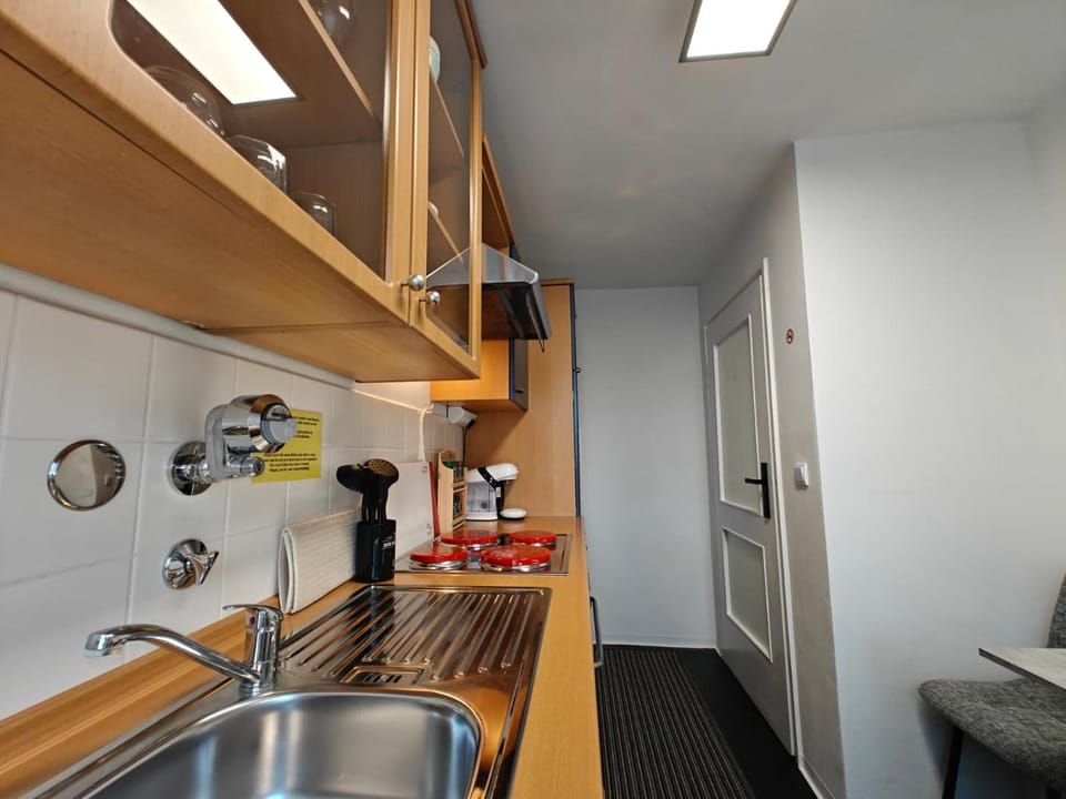 Kitchen or kitchenette, stove