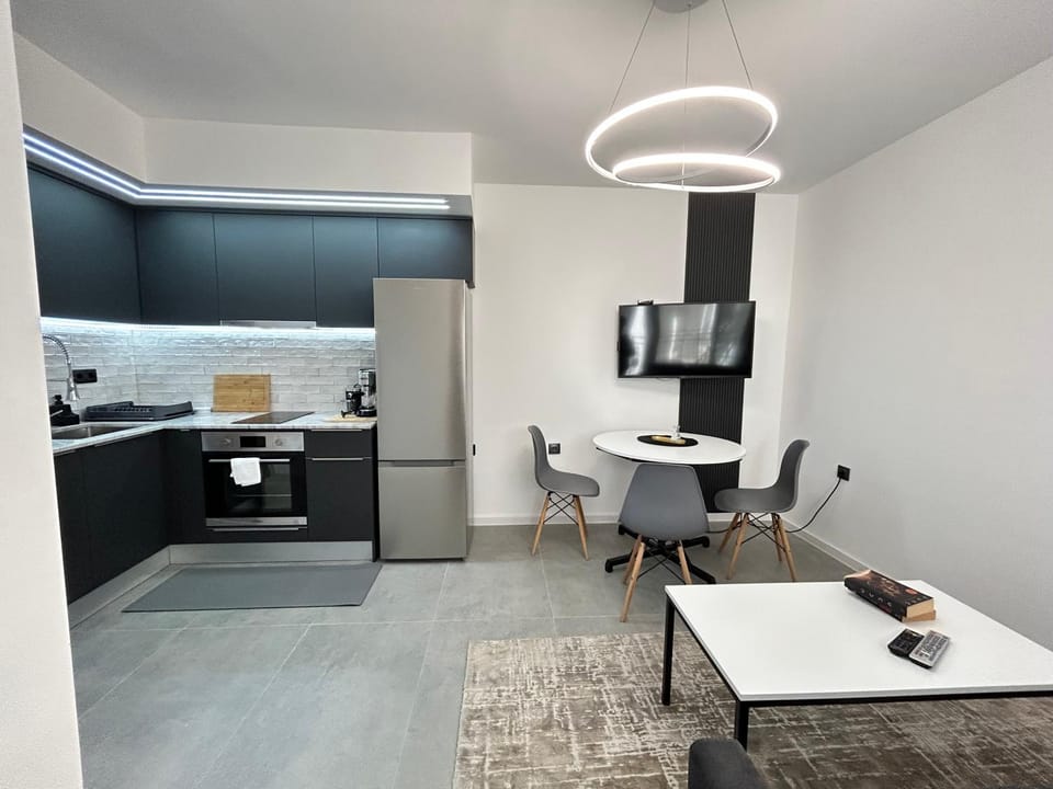 Kitchen or kitchenette, Living room, Seating area, Dining area