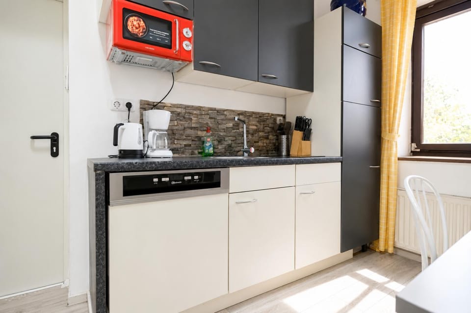 Kitchen or kitchenette, oven, stove, toaster