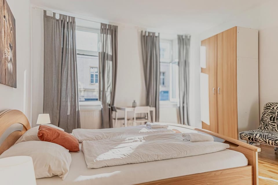 Bed, Seating area, Bedroom, towels, wardrobe