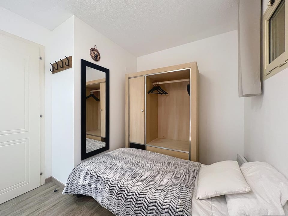 Bed, wardrobe