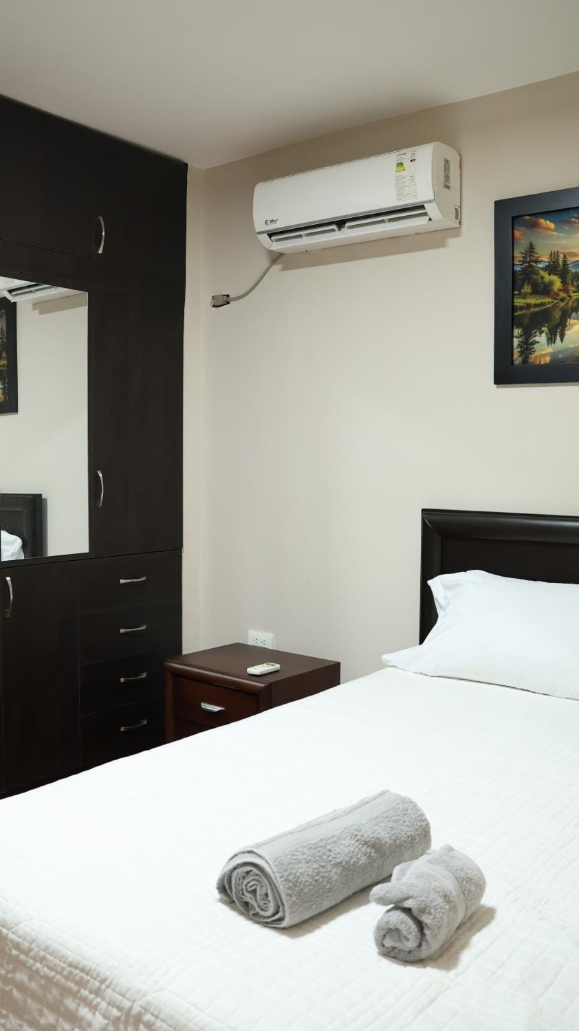 Bed, Bedroom, towels, air conditioner