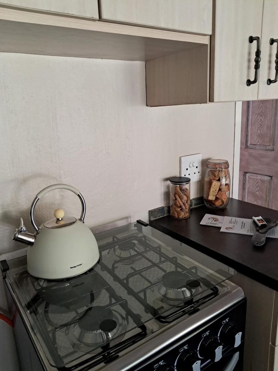 Kitchen or kitchenette, stove