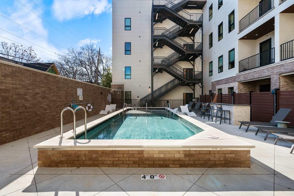 Three King Suites with Pool Gym Balcony & Garage Right On Music Row Downtown Views from Rooftop Walk to RCA Studio B & Local Dining Under 2 miles to Broadway Elevator Access 24 Hr Hospitality House in Music Row