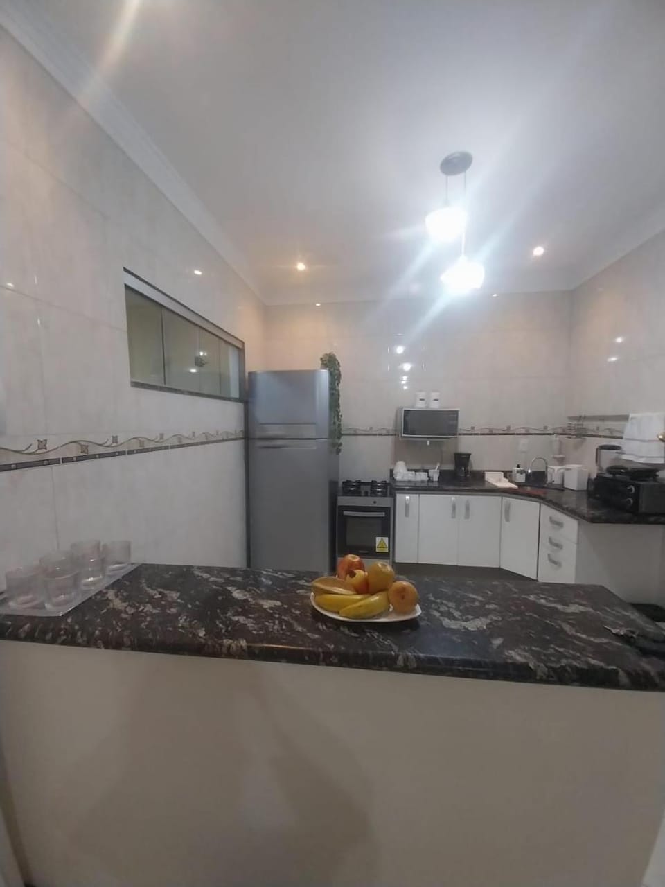 Kitchen or kitchenette, oven, stove