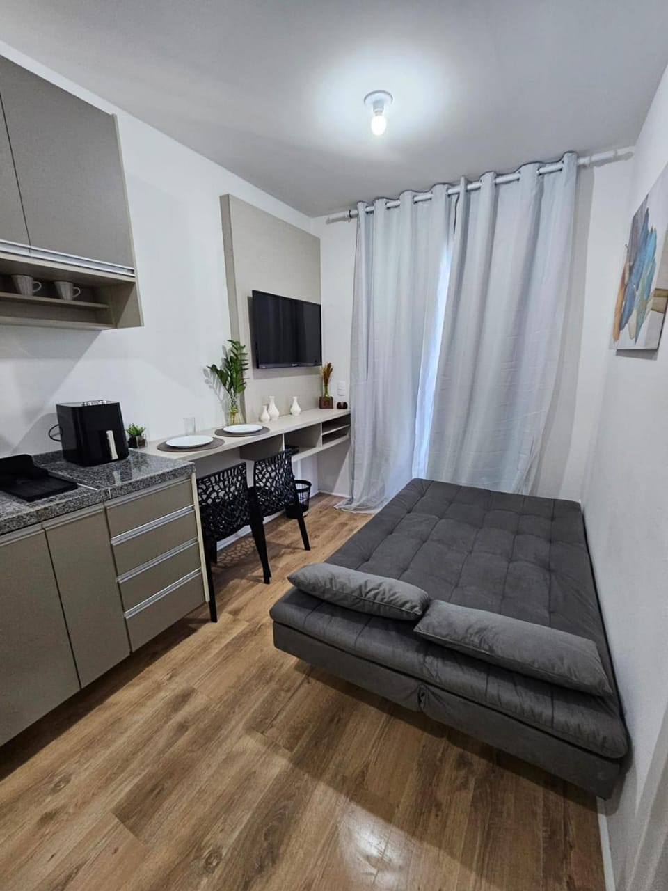 Bed, TV and multimedia, Living room, Seating area