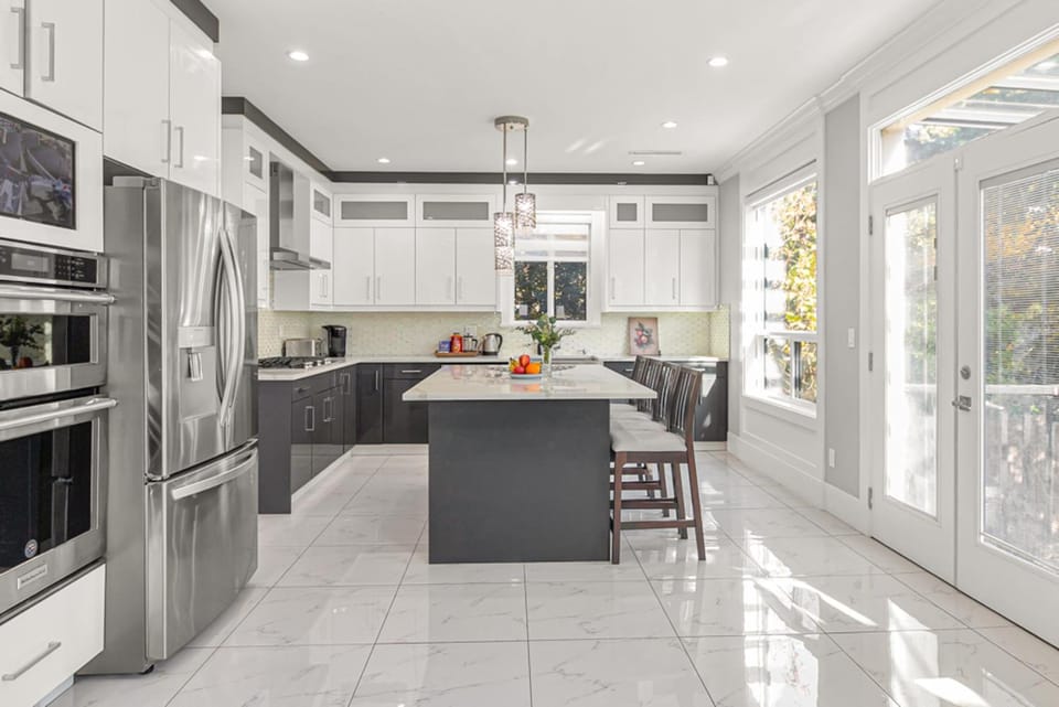 Kitchen or kitchenette, dishwasher, oven, stove