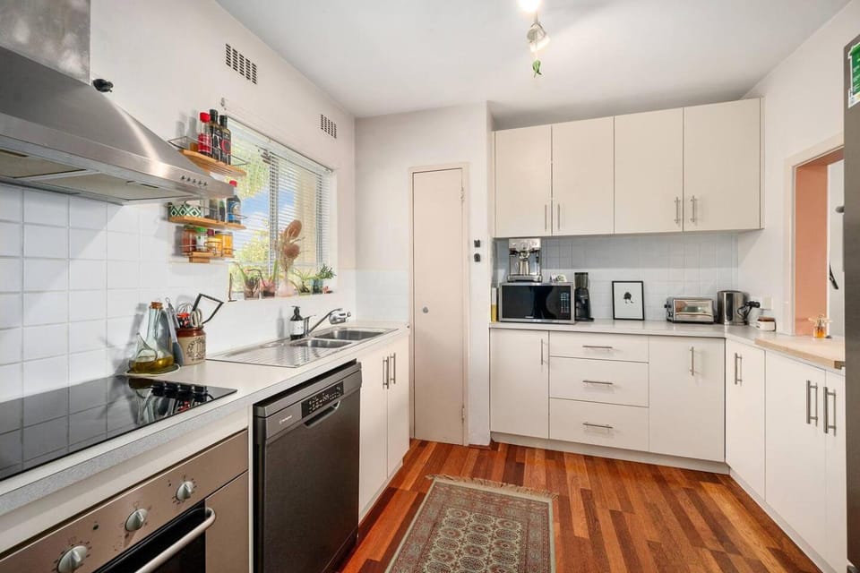 Kitchen or kitchenette, dishwasher, oven, stove, toaster