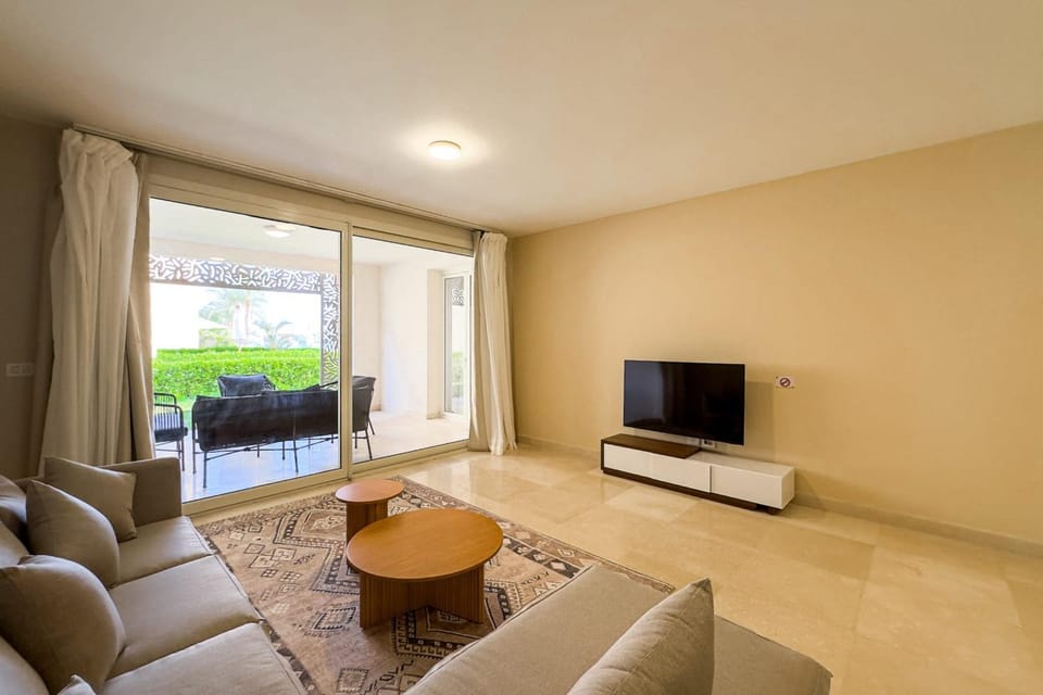 Patio, TV and multimedia, View (from property/room), Living room, Seating area, furniture