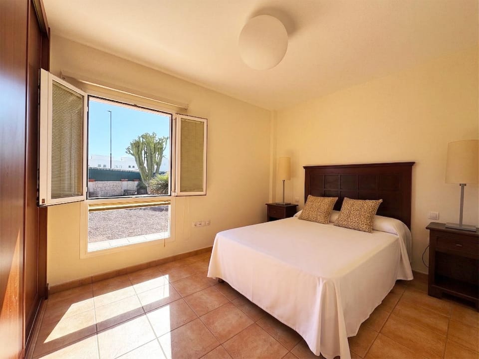 Property building, Bed, Bedroom, Garden view, wardrobe