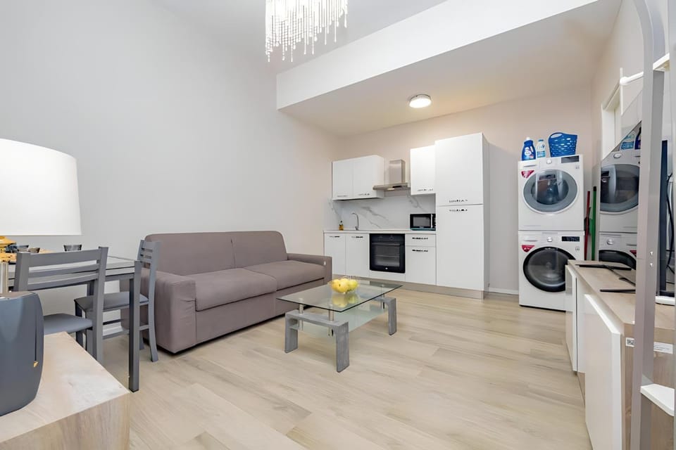 TV and multimedia, Kitchen or kitchenette, Living room, Seating area, oven, stove, washing machine, dryer