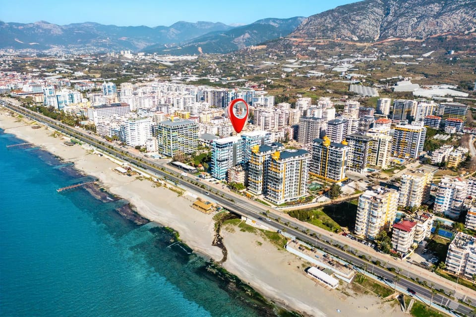 Property building, Nearby landmark, Day, Neighbourhood, Natural landscape, Bird's eye view, Beach, City view, Mountain view, Sea view, Street view, Location