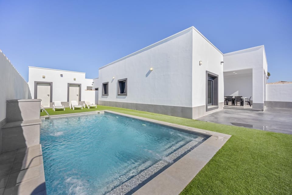 Property building, Living room, Swimming pool