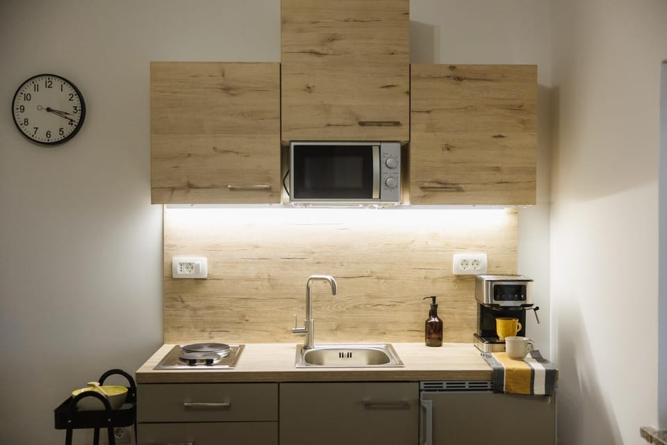 Kitchen or kitchenette, stove