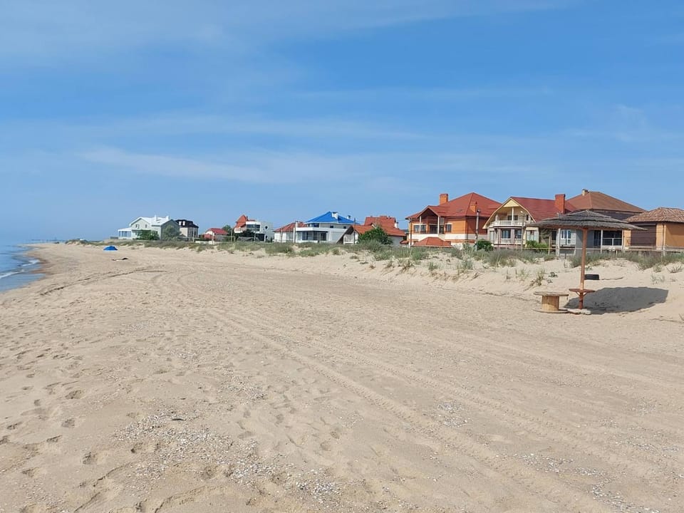 Property building, Day, Natural landscape, Beach, Sea view
