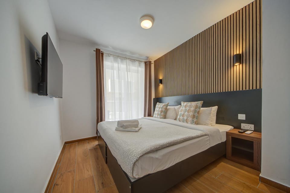 Bed, TV and multimedia, Bedroom, towels, wardrobe