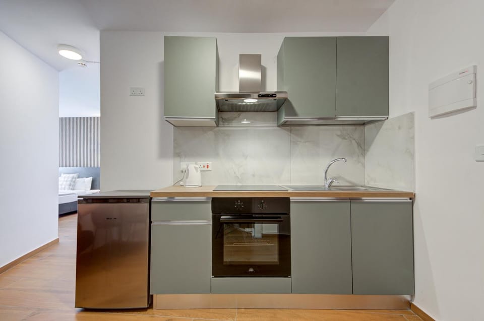 Kitchen or kitchenette, oven, stove