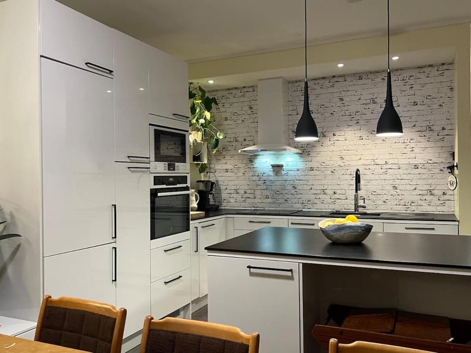 Cozy terrace house with 3 bedrooms and parking Apartment in Tromso