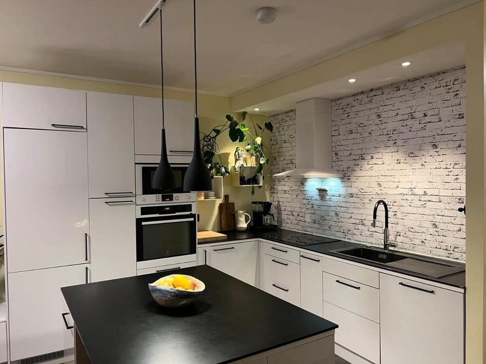 Cozy terrace house with 3 bedrooms and parking Apartment in Tromso