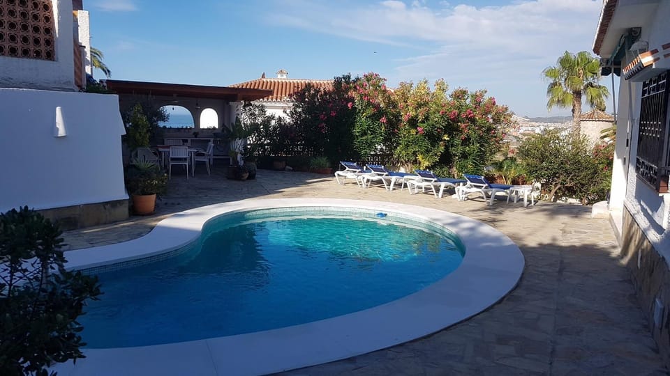 Property building, Living room, Swimming pool