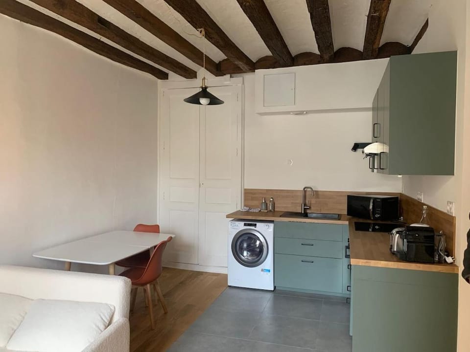 Kitchen or kitchenette, Living room, Dining area, oven, stove, toaster, washing machine