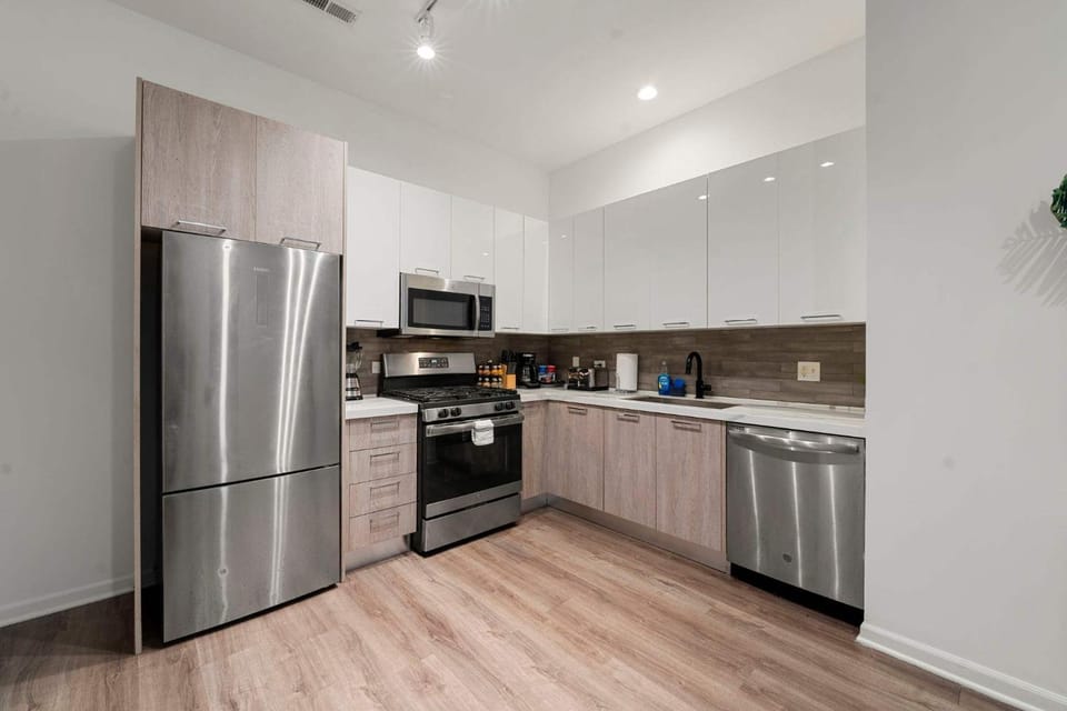 Kitchen or kitchenette, dishwasher, oven, stove, toaster