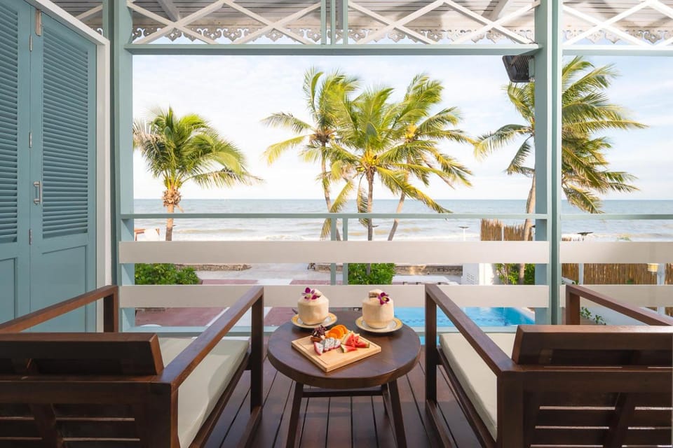 Patio, Natural landscape, Balcony/Terrace, Seating area, Beach, Pool view, Sea view