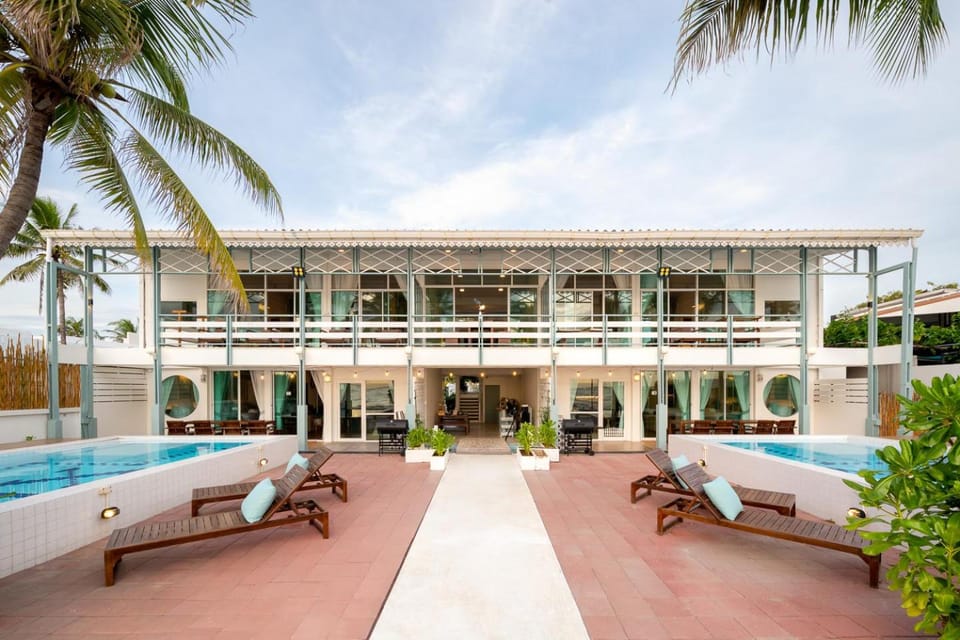 Property building, Patio, Day, Natural landscape, Beach, Pool view, Swimming pool, sunbed