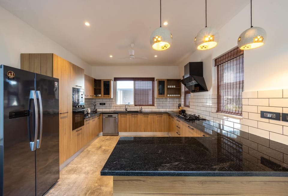 Kitchen or kitchenette, dishwasher, oven, stove