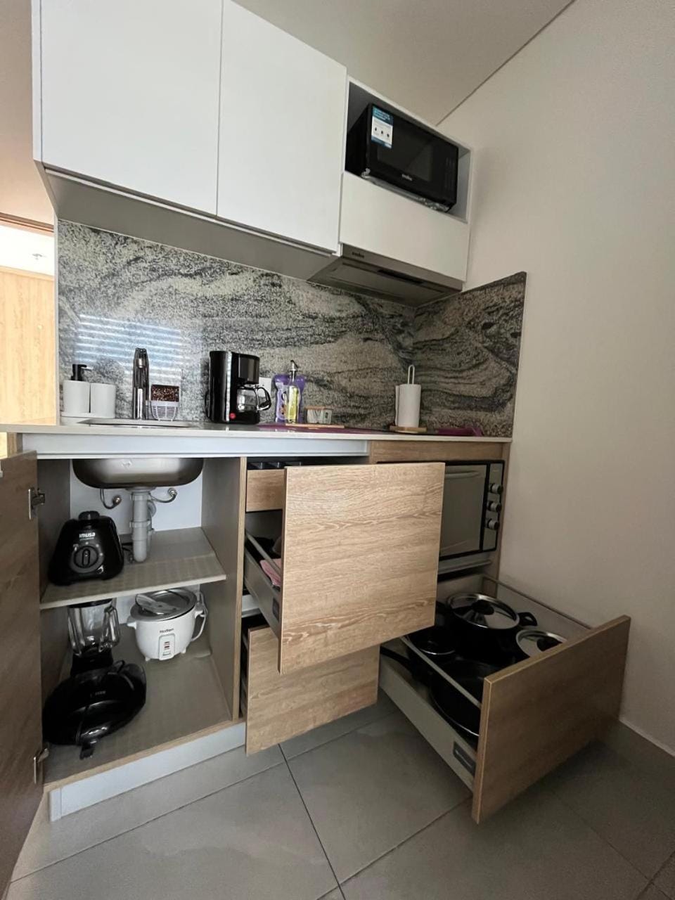Kitchen or kitchenette, oven, stove