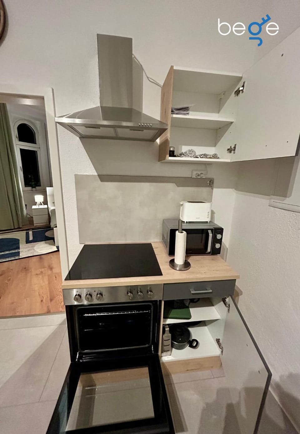 Kitchen or kitchenette, stove, toaster