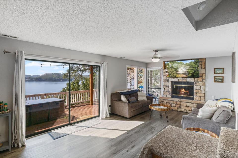 View (from property/room), Living room, Seating area, Lake view