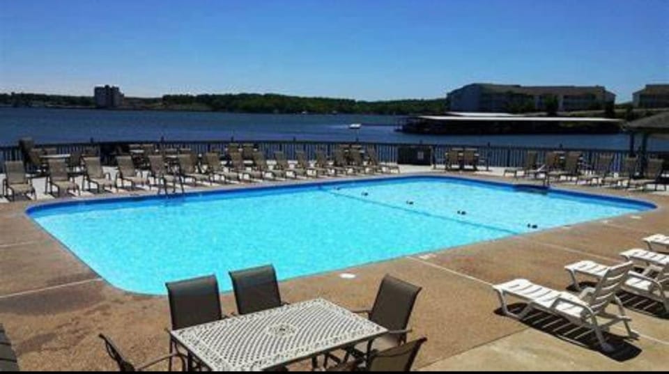 Property building, Pool view, Swimming pool, sunbed