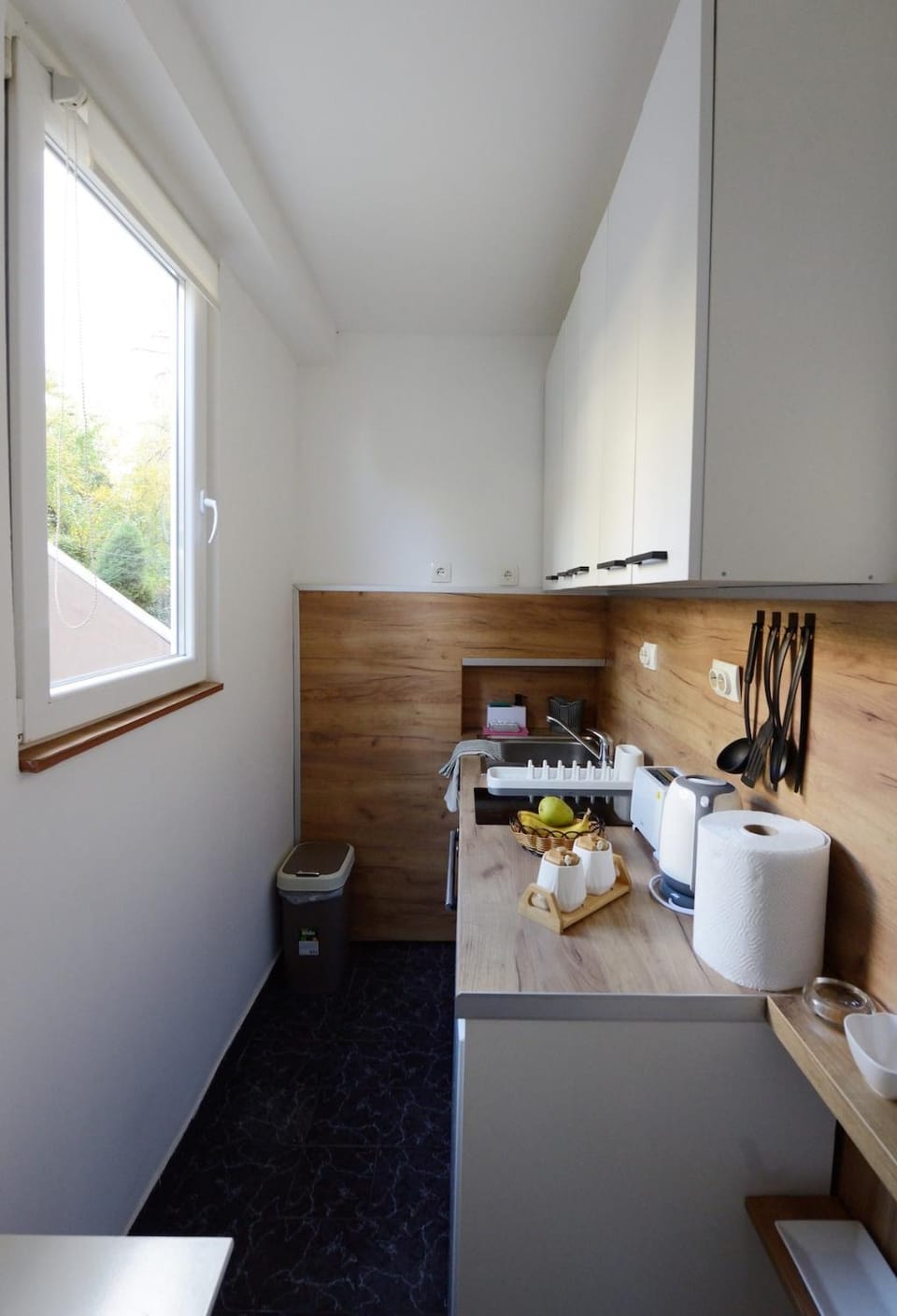 Kitchen or kitchenette, stove, toaster