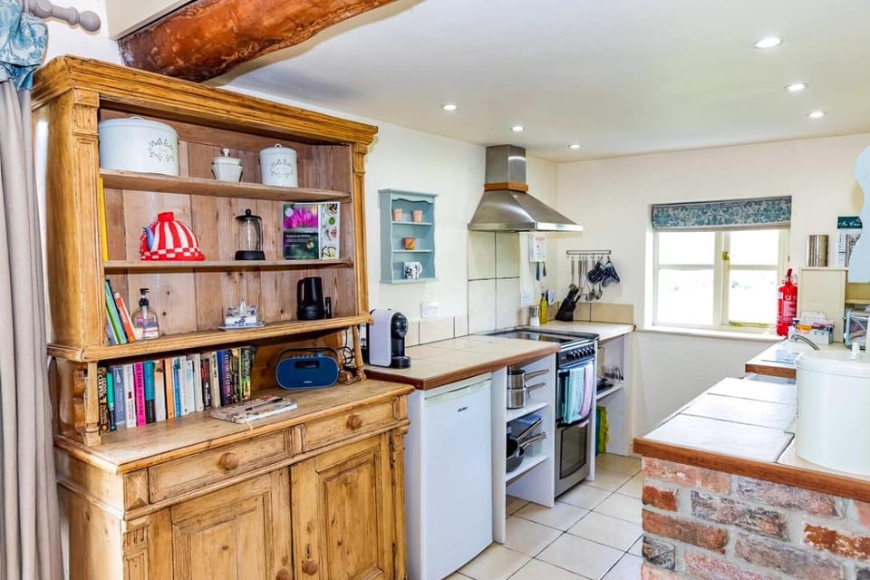 Kitchen or kitchenette, dishwasher, oven, stove, toaster