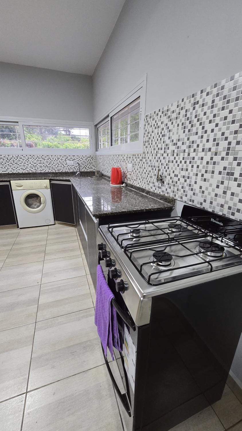 Kitchen or kitchenette, washing machine