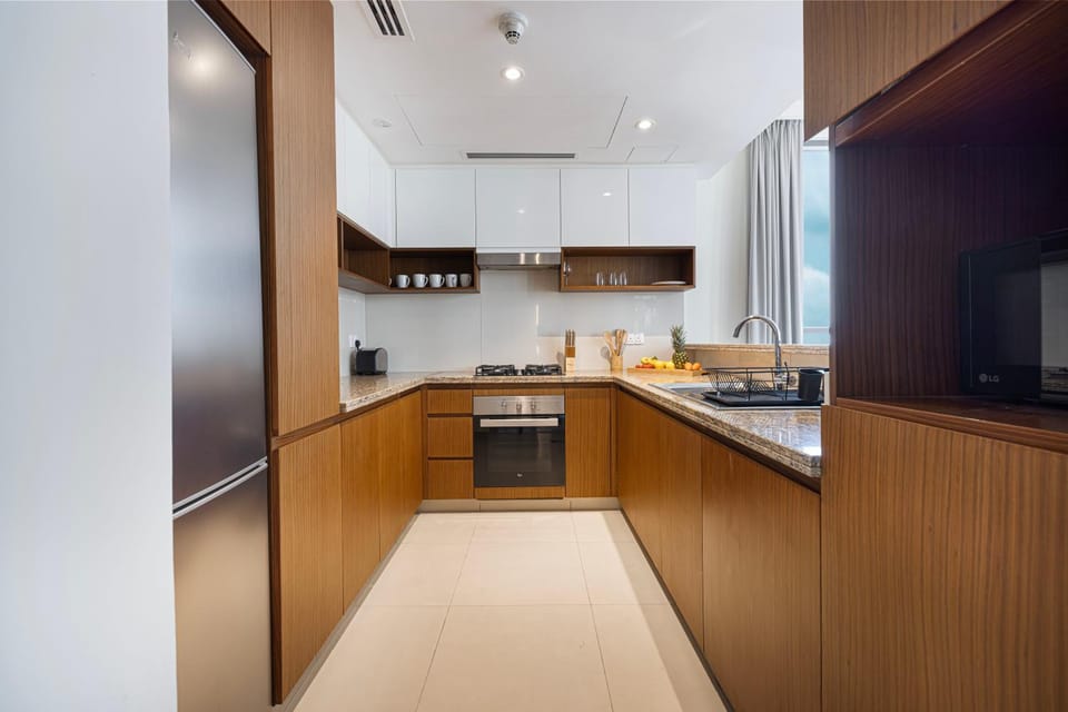 Kitchen or kitchenette, microwave, oven, toaster