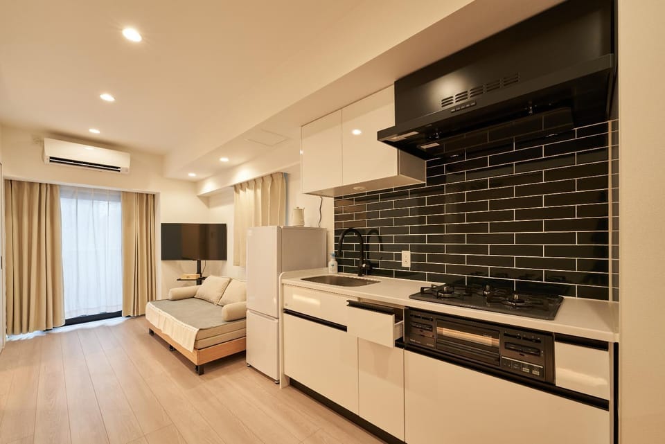 TV and multimedia, Kitchen or kitchenette, Living room, Seating area, minibar, air conditioner