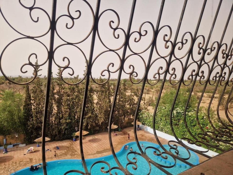 View (from property/room), Pool view, Swimming pool