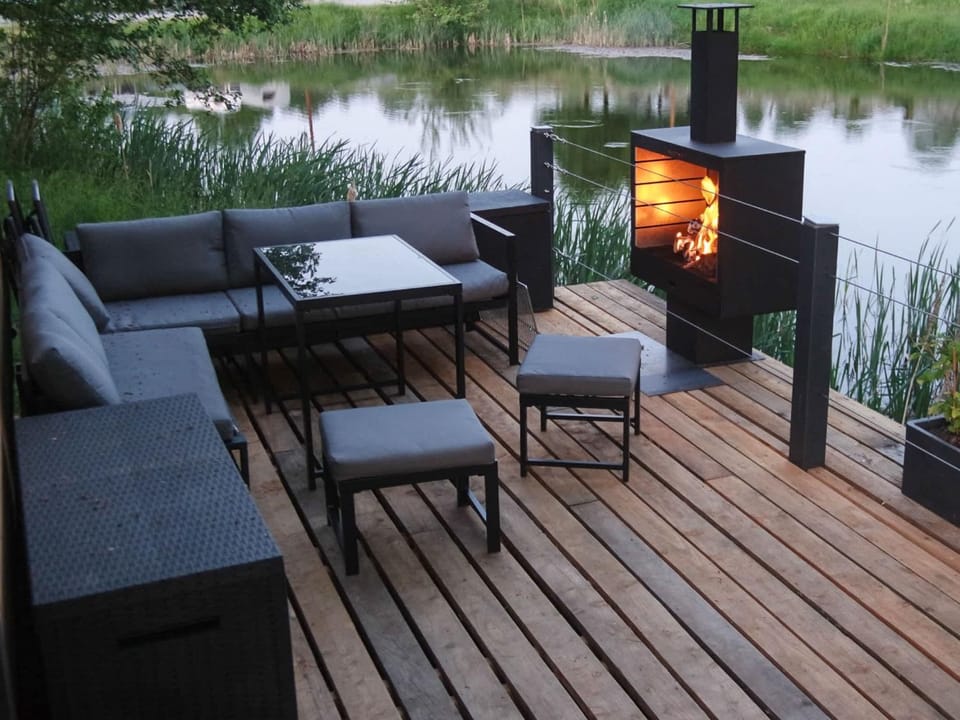 Natural landscape, BBQ facilities, Seating area, Lake view, fireplace