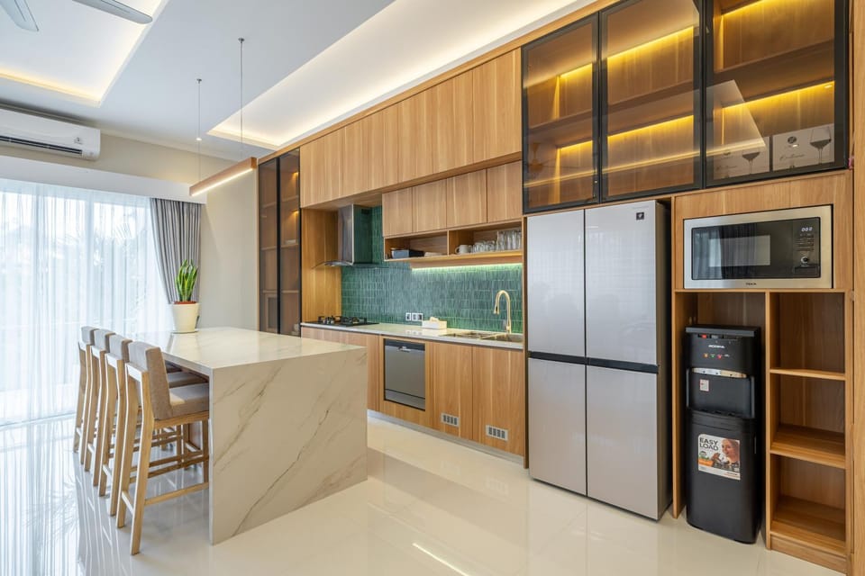 Kitchen or kitchenette, dishwasher, oven, stove, toaster, air conditioner